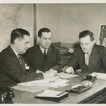 Frank Soloman, Harry Seigel, and Arthur M. Dewey working