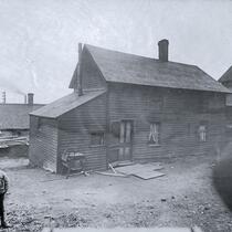 Unidentified house and child